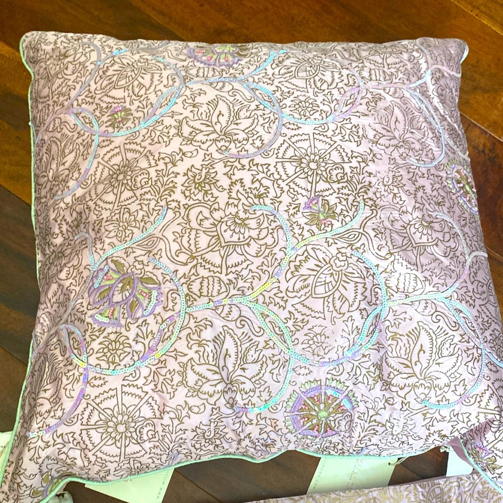 4 elegant pink and gold placemats with sequins and beading.